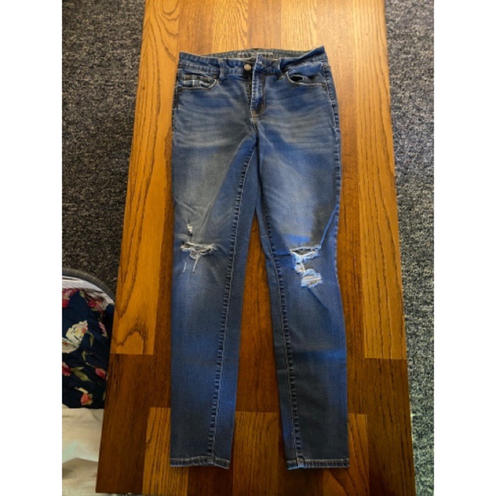 Mid Rise Ripped Skinny Jeans